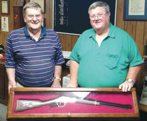 FFAM President Kenny Hoover (Right) meets with Mr. Loren Biggers (Left) who is a retired contractor in Mexico, Missouri. Mr. Biggers handmade and donated this beautiful all walnut locking gun case that will be raffled along with the donated Henry Golden Boy Firefighter Edition Rifle. All proceeds going to the construction of the Firefighter Museum at Kingdom City.